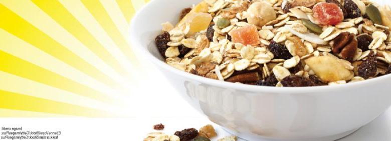 bowl of whole grains with sun rays behind it image